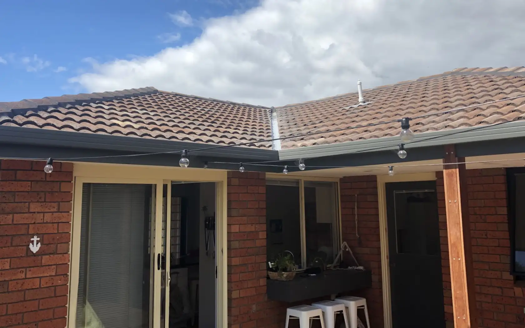 Tiled roof and gutters on a Mornington home