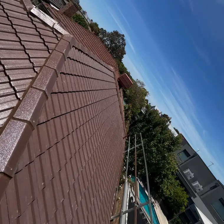 Restored charcoal tiled roof in Mornington