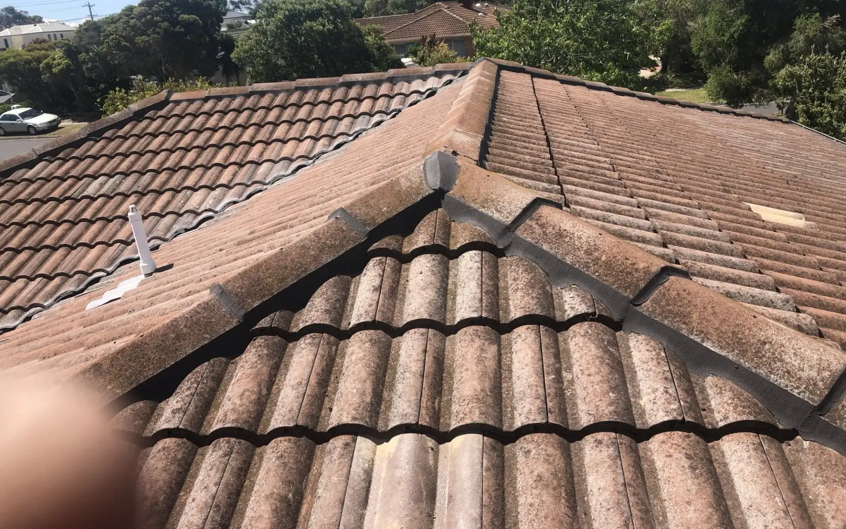 Old tired tiled roof before an upgrade